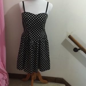 Black tea length dress with white polka dots