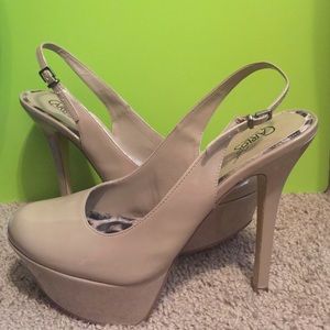 Platform pumps. Gently worn. Still in great shape