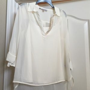 Jennifer Lopez antique white blouse
