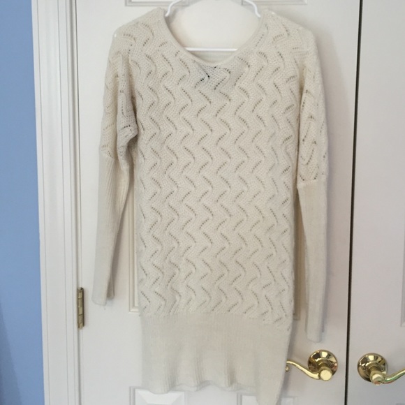 Long cream sweater