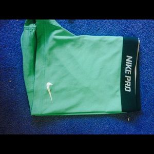 Mint green Nike pros