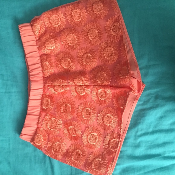peach/coral colored daisy shorts
