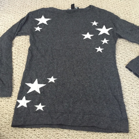 Grey sweater with white stars on the front