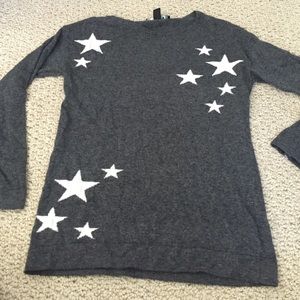 Grey sweater with white stars on the front