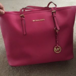 Michael Kors pink travel bag