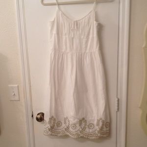 White dress with gold embroidery