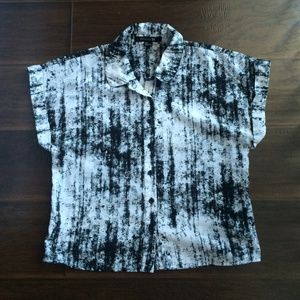 Buttoned down shirt.