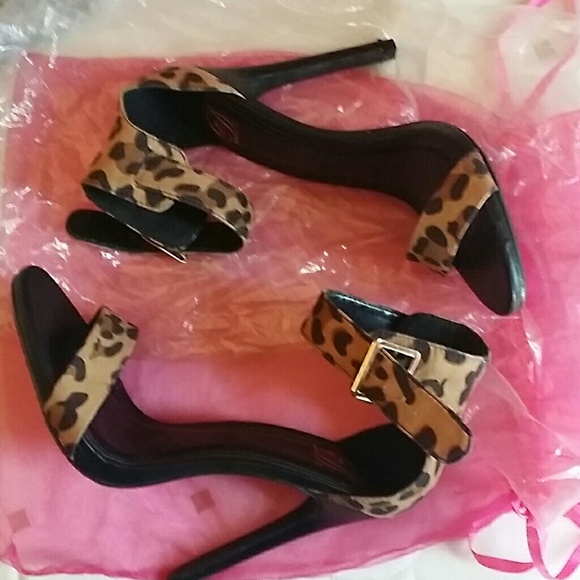 Sexy high leopard heels , never worn !