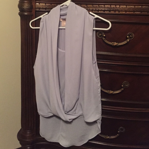 Lavender loose fitting blouse.