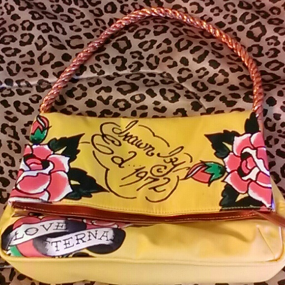 Ed Hardy fold over purse.