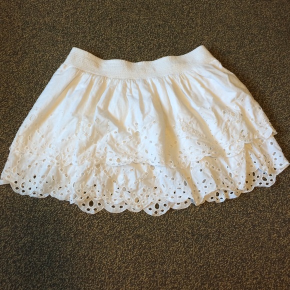 White ruffled skirt.