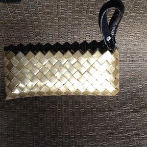 Gold tone wristlet