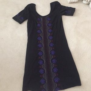 Tunic dress with embroidery on the front