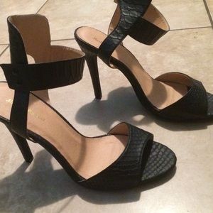 Ankle strap black heels size 9.