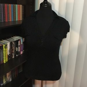 Black top with white polka dots