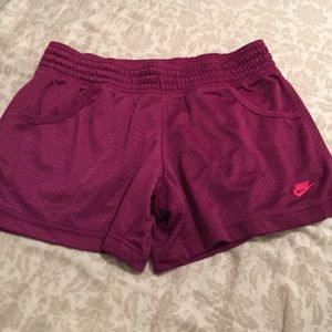 purple mesh Nike shorts