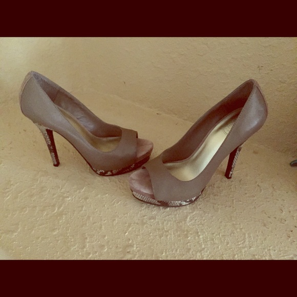 Brown and snake skin heels.
