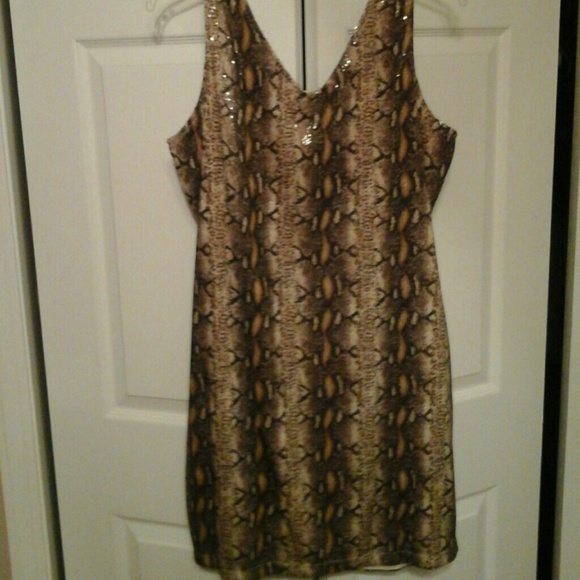 A gorgeous snake skin and sequin design dress