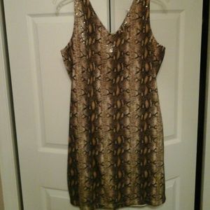 A gorgeous snake skin and sequin design dress