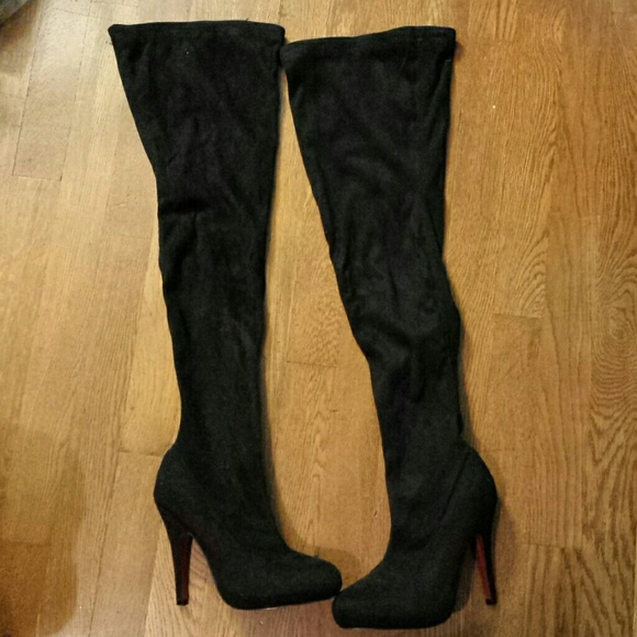 Worn a couple times - thigh high black boots