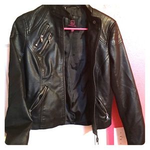 Black polyester black jacket. Very fun and chic