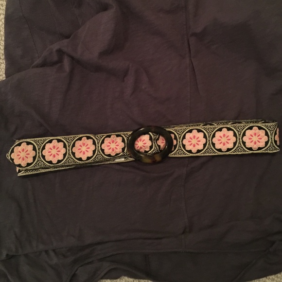 Reversible pink and blue flowered belt.