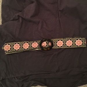 Reversible pink and blue flowered belt.