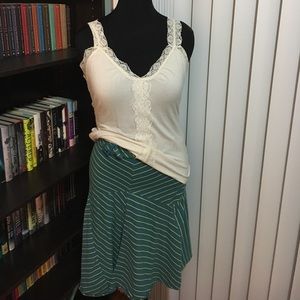 Blue, green and white striped skirt.