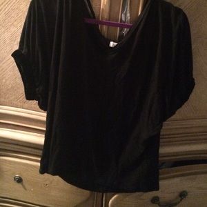 Black shirt with velvet around the sleeve