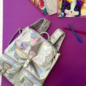 HOLD @sweetypieheart Nastygal Hologram backpack