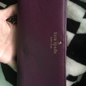 Kate spade purple wallet.