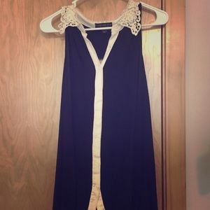 Cute black and white tank top with cutout back!!