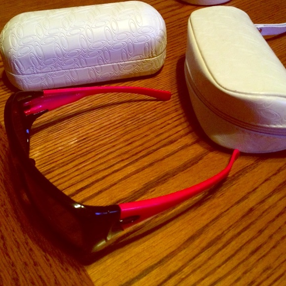 Pink Oakley sunglasses with hard and soft case