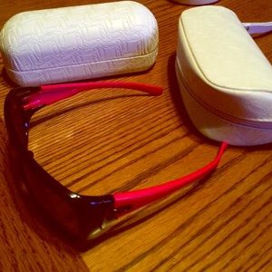Pink Oakley sunglasses with hard and soft case