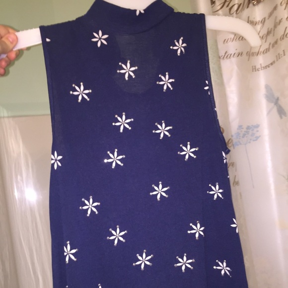 Blue sleeveless high neckline top