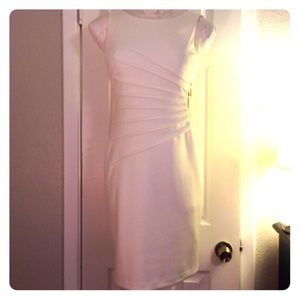 Ivanka Trump cream sleeveless dress