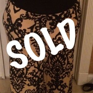 Beige and black stretch wide leg pants