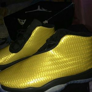 Gold Jordan future 11's / brand new / size 5