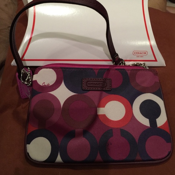 New never used Coach signature wristlet