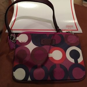 New never used Coach signature wristlet