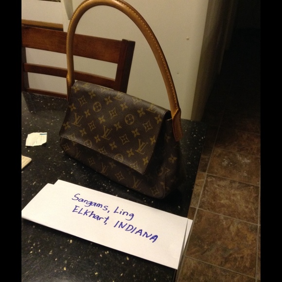 Authentic Louis Vuitton Mini looping