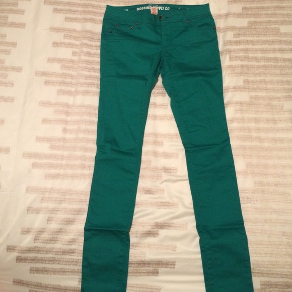 Teal green skinny jeans