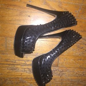 Black peep toe pumps