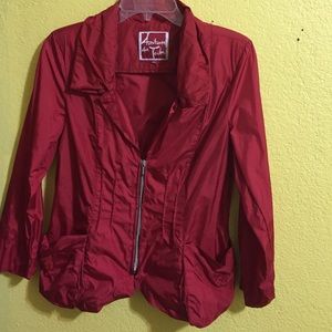 Red partial zip windbreaker