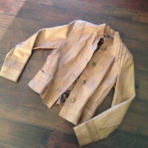 Fitted leather jacket with pretty feminine details