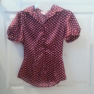 red polka dot shirt