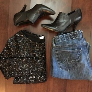 Super cute 3/4 sleeve black sequin sweater.