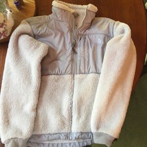 White fuzzy North Face jacket