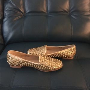 Steve maddens gold loafers