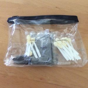 Plastic cosmetics bag with makeup applicators NEW